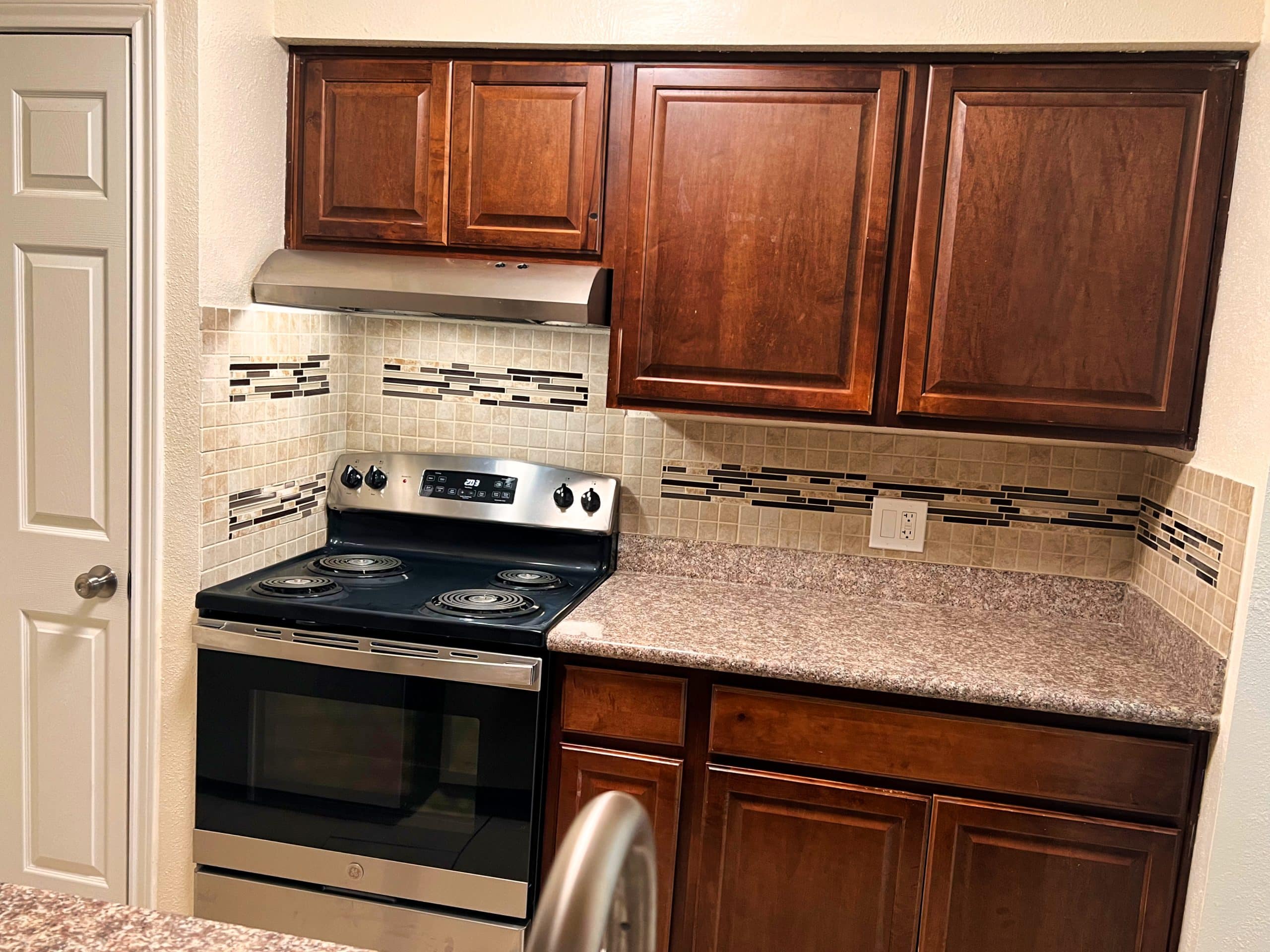 Modern kitchen with stainless steel appliances